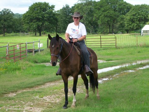 Nadine riding Peruvian Paso gelding, Jamie Real, nicknamed Hemi